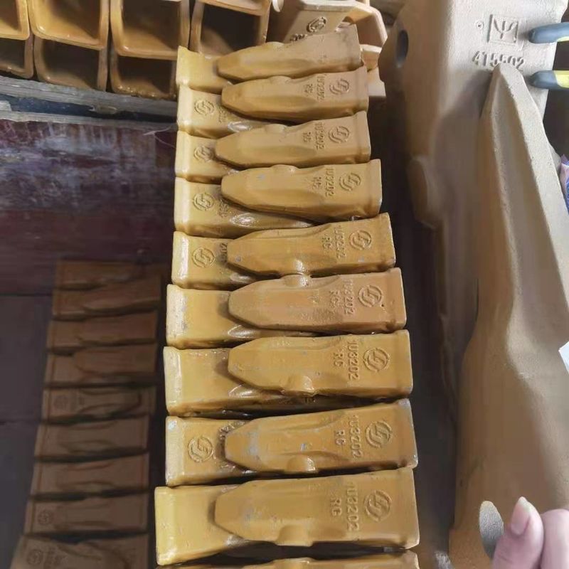 Adaptador de dente de balde de escavadeira e placa de lâmina melhor preço e dente de balde duro