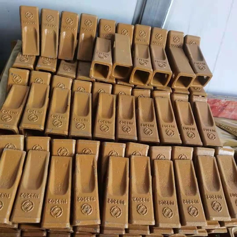 Adaptador de dente de balde de escavadeira e placa de lâmina melhor preço e dente de balde duro