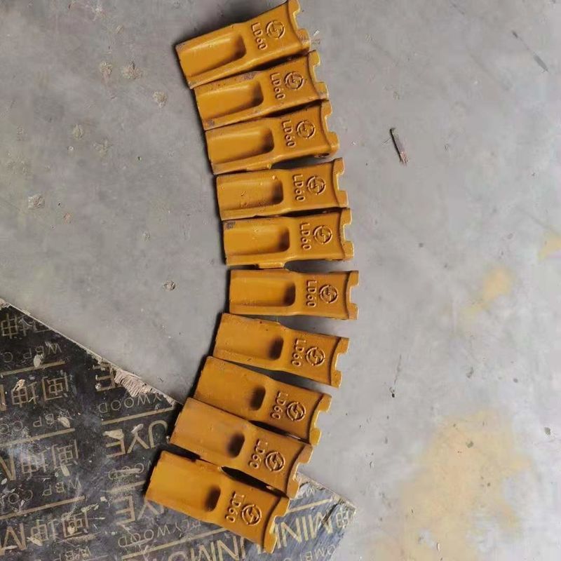 Adaptador de dente de balde de escavadeira e placa de lâmina melhor preço e dente de balde duro